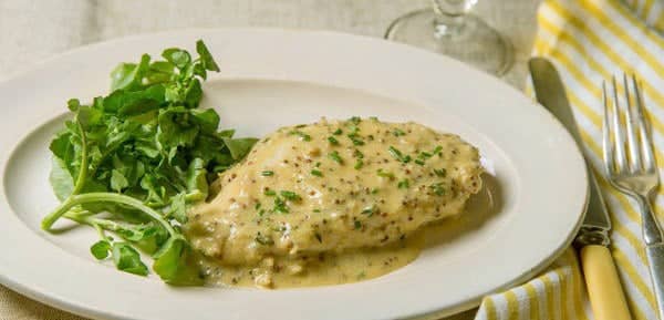 Chicken breasts with green chili-almond cream sauce