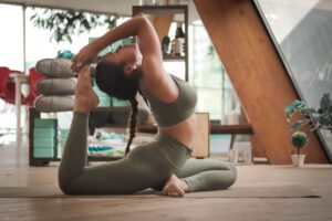 women doing yoga, yoga props on the back